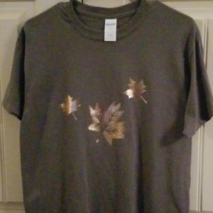 Beautiful grey t shirt decorated with gold leaf